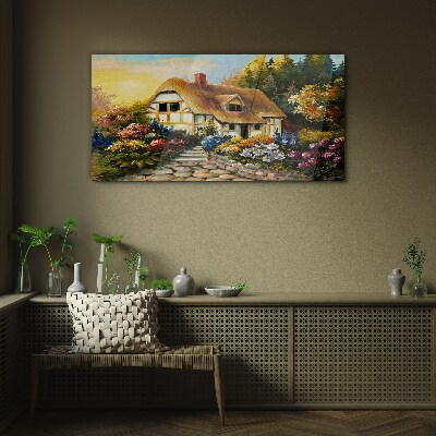 Tableau photo sur verre Un charmant cottage de campagne entouré de fleurs