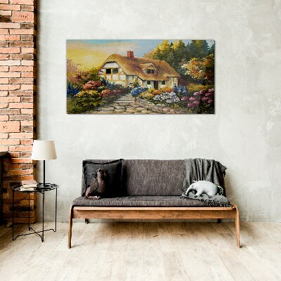 Tableau photo sur verre Un charmant cottage de campagne entouré de fleurs