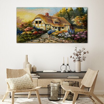 Tableau photo sur verre Un charmant cottage de campagne entouré de fleurs