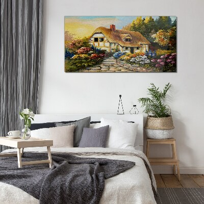 Tableau photo sur verre Un charmant cottage de campagne entouré de fleurs