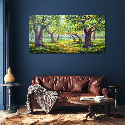 Tableau photo sur verre Un bosquet vert sous les rayons du soleil