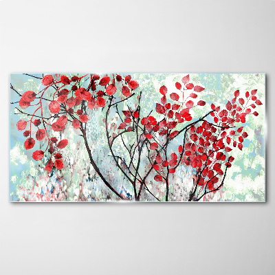 Tableau photo sur verre Feuilles rouges sur fond bleu
