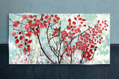Tableau photo sur verre Feuilles rouges sur fond bleu