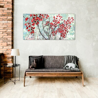 Tableau photo sur verre Feuilles rouges sur fond bleu