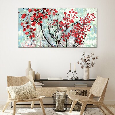 Tableau photo sur verre Feuilles rouges sur fond bleu