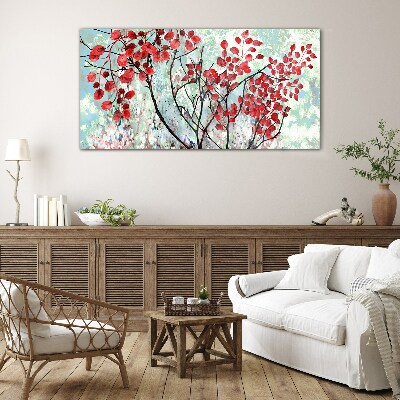 Tableau photo sur verre Feuilles rouges sur fond bleu