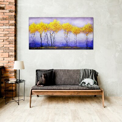 Tableau photo sur verre Des arbres dorés dans un paysage violet