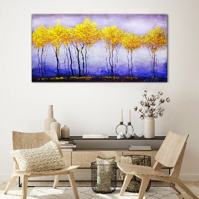 Tableau photo sur verre Des arbres dorés dans un paysage violet