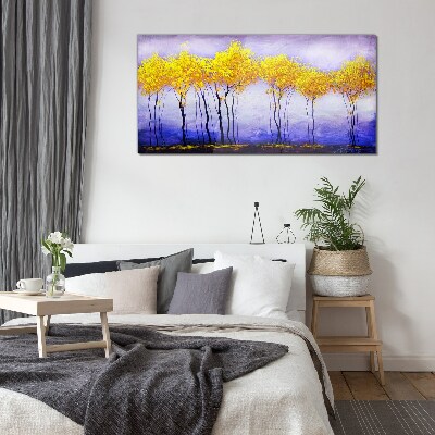 Tableau photo sur verre Des arbres dorés dans un paysage violet