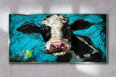 Tableau imprimé sur verre Portrait d'une vache sur fond bleu