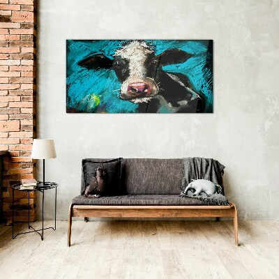 Tableau imprimé sur verre Portrait d'une vache sur fond bleu