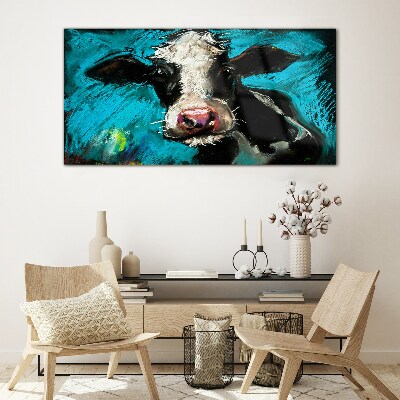 Tableau imprimé sur verre Portrait d'une vache sur fond bleu