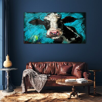 Tableau imprimé sur verre Portrait d'une vache sur fond bleu