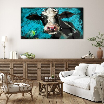 Tableau imprimé sur verre Portrait d'une vache sur fond bleu