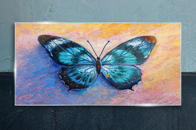 Tableau sur verre Papillon bleu sur fond pastel