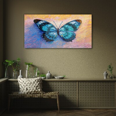 Tableau sur verre Papillon bleu sur fond pastel