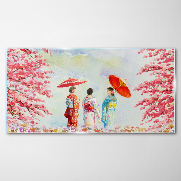 Tableau en verre Une promenade printanière sous les arbres en fleurs