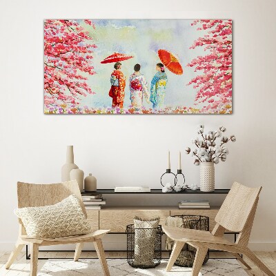 Tableau en verre Une promenade printanière sous les arbres en fleurs