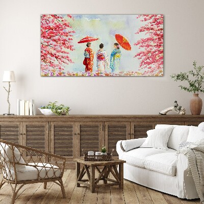 Tableau en verre Une promenade printanière sous les arbres en fleurs