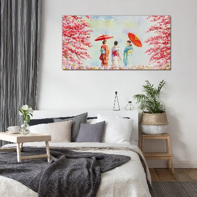 Tableau en verre Une promenade printanière sous les arbres en fleurs