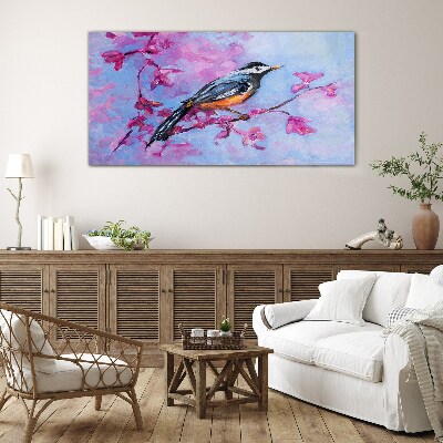 Tableau photo sur verre Oiseau de printemps sur des branches roses