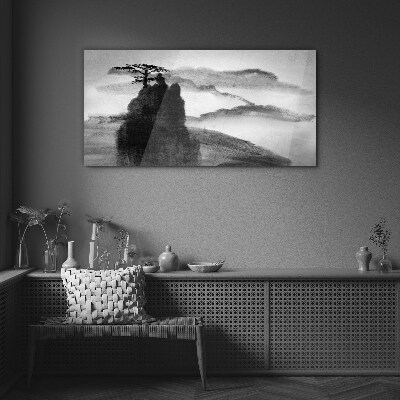 Tableau en verre Un arbre solitaire sur une montagne rocheuse