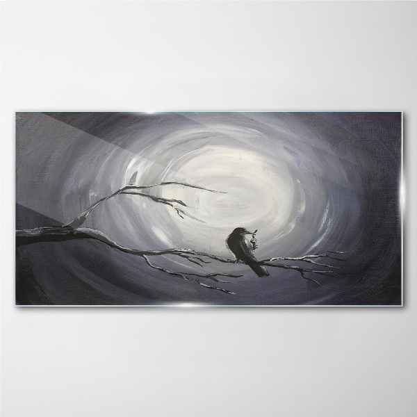 Tableau imprimé sur verre Un oiseau solitaire sur une branche