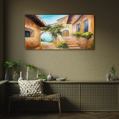 Tableau sur verre Les charmantes rues du village balnéaire