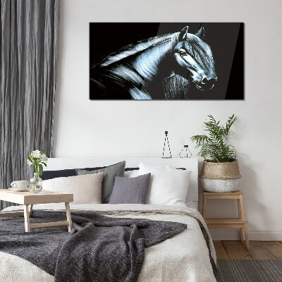 Tableau verre imprimé Un cheval noir dans la lueur de la lumière