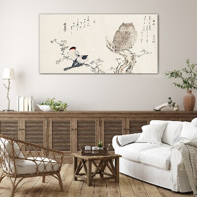 Tableau photo sur verre Des oiseaux et un hibou sur une branche