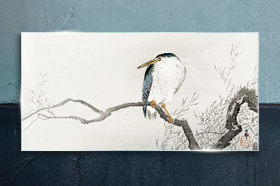 Tableau sur verre Un oiseau sur une branche dans un paysage délicat
