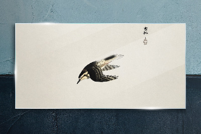 Tableau photo sur verre Le vol d'un oiseau en silence