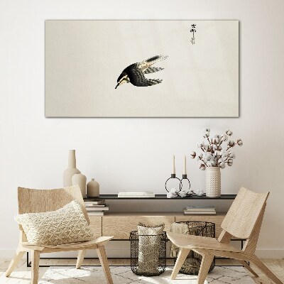 Tableau photo sur verre Le vol d'un oiseau en silence