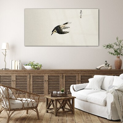 Tableau photo sur verre Le vol d'un oiseau en silence