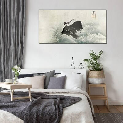 Tableau photo sur verre Un oiseau sur un rocher dans les vagues