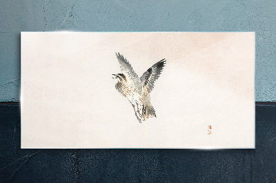 Tableau sur verre Vol d'oiseau aux couleurs délicates