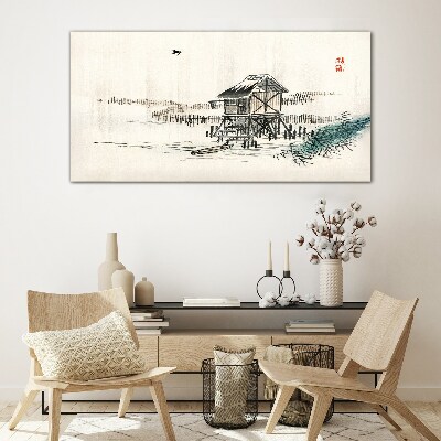 Tableau verre imprimé Un chalet tranquille au bord de l'eau