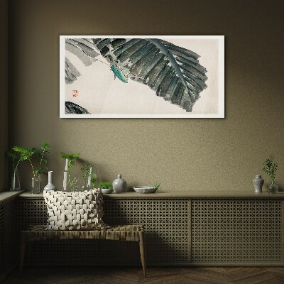 Tableau photo sur verre Un insecte mince sur les feuilles