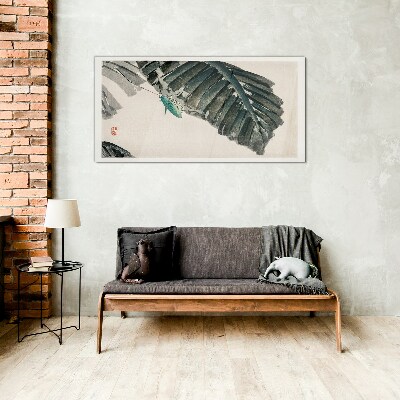 Tableau photo sur verre Un insecte mince sur les feuilles