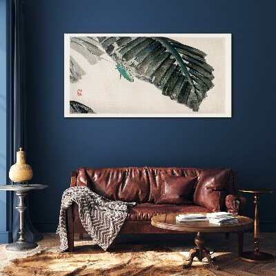 Tableau photo sur verre Un insecte mince sur les feuilles