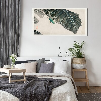 Tableau photo sur verre Un insecte mince sur les feuilles