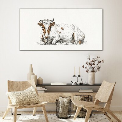 Tableau en verre Une vache calme dans le pré