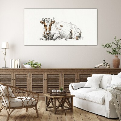 Tableau en verre Une vache calme dans le pré