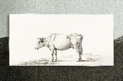 Tableau verre imprimé Une vache calme sur fond de nature