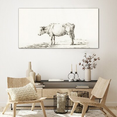 Tableau verre imprimé Une vache calme sur fond de nature
