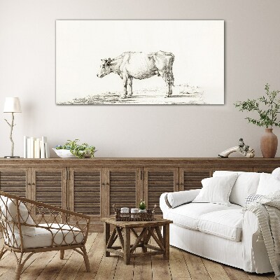 Tableau verre imprimé Une vache calme sur fond de nature