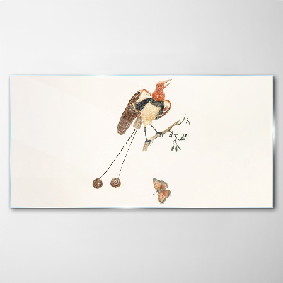 Tableau sur verre Un oiseau sur une branche avec des fruits
