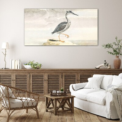 Tableau imprimé sur verre Un oiseau migrateur sur fond de nature