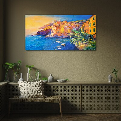 Tableau photo sur verre Une ville colorée au bord de la mer