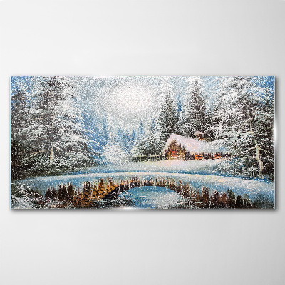 Tableau imprimé sur verre Paysage d'hiver avec un chalet dans la forêt